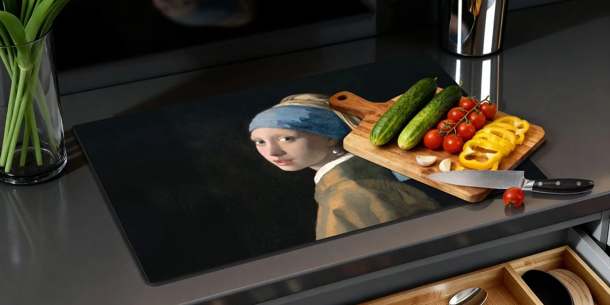 Inductiebeschermer met een ontwerp op een uitgeschakelde kookplaat
